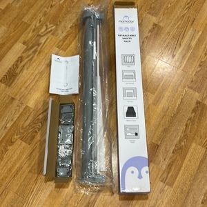 Retractable safety gate